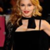 Madonna looks fabulous in velvet and lace as she attends W.E. UK premiere
