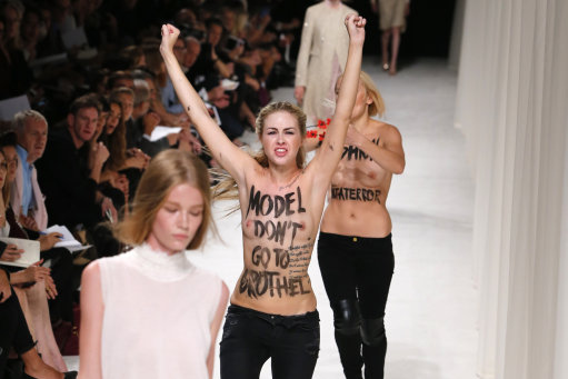 Nina Ricci Catwalk Stormed By Femen – All The Pictures (Editor Notes Nudity)