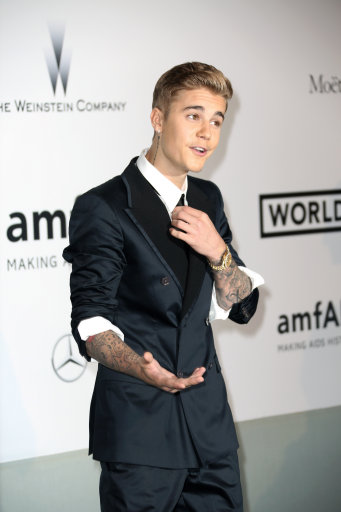 Justin Bieber Joins The Ladies On Red Carpet for 67th Cannes Film Festival – amfAR Gala