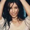 Kim Kardashian covered topless in March’s Allure Magazine