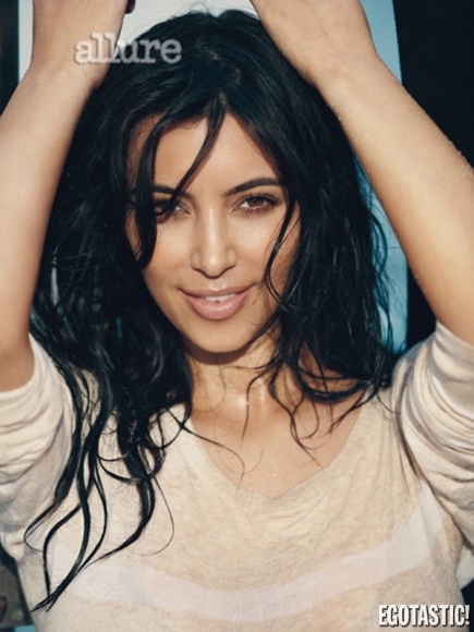Kim Kardashian covered topless in March’s Allure Magazine
